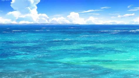 the ocean is blue and green with white clouds