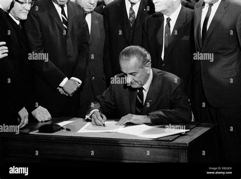 President Lyndon Baines Johnson signs the 1968 Civil Rights Bill. April 11, 1968 Stock Photo - Alamy