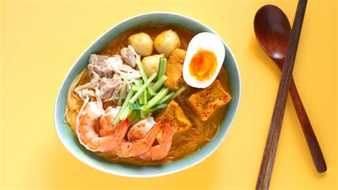 An authentic curry laksa recipe from Malaysia and Singapore, 'laksa lemak' is a typical Nyonya ...