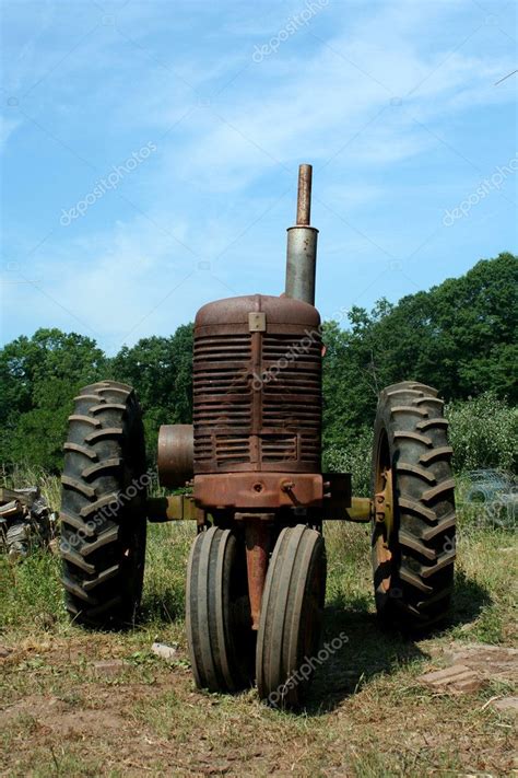 Old rusty farm tractor — Stock Photo © njnightsky #3443185