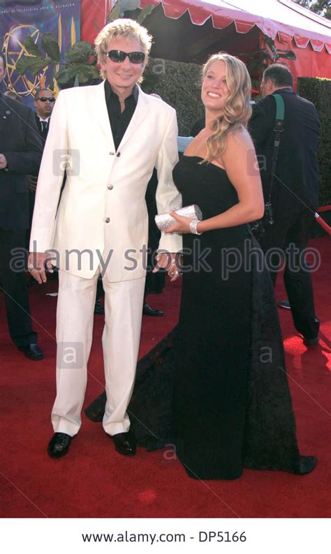 Barry manilow and his goddaughter Kirsten at the Emmy Awards. | Barry manilow, Emmy awards, Barry