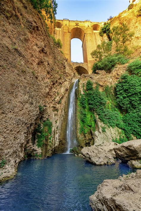 Iconic bridge and waterfall in Ronda, Spain Photograph by Ben Ford - Pixels