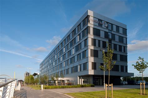 Premier Inn, Pacific Quay by LMA Architects