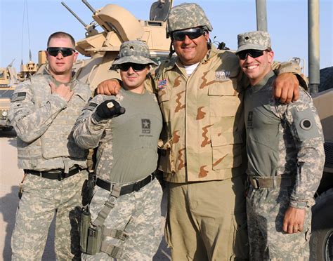 Tony Siragusa, second from right, former National Football League player and co-host of DIY ...