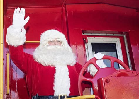 Santa Rides the Train stock photo. Image of celebration - 201490552