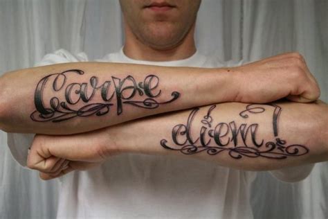 Cool carpe diem latin quote tattoo on arm - Tattooimages.biz