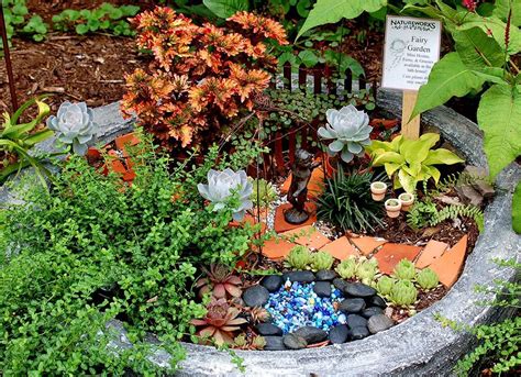 Fairy Garden in a Planter | Miniature fairy gardens, Fairy garden ...