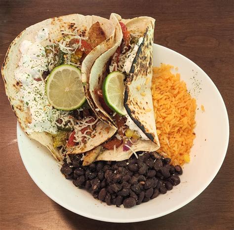 Swai fish tacos, yellow rice, and black beans. : r/tonightsdinner