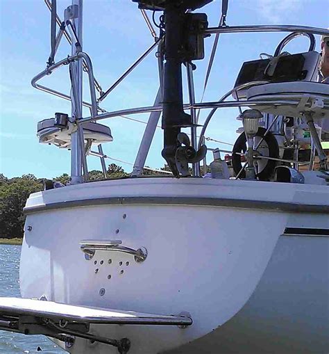 Anyone ever mount a dinghy outboard motor on a stern rail mounting bracket? | Catalina 36/375 ...