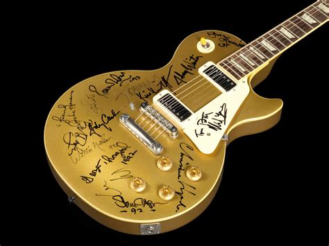 Gibson Les Paul Goldtop signed by George Harrison, Bob Dylan, Eric ...