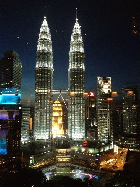 Petronas Twin Towers day to night