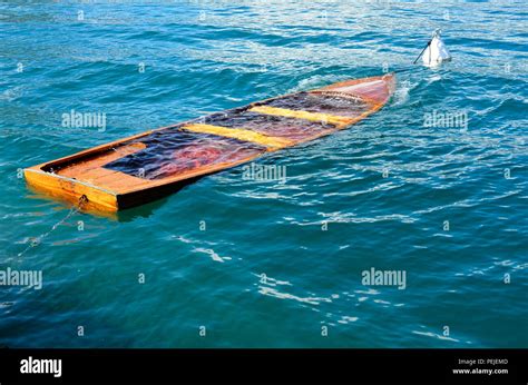 Wood dock sinking in water hi-res stock photography and images - Alamy