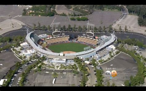 Fan critically injured in fight outside Dodger Stadium - CBS News