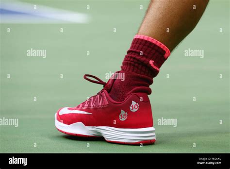 Grand Slam champion Rafael Nadal of Spain wears custom Nike tennis shoes during US Open 2017 ...