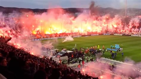 Watch Greek football fans turn their stadium into an insane “ring of ...