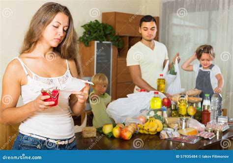 Poor Family with Bags of Food Stock Photo - Image of family, poor: 57935484