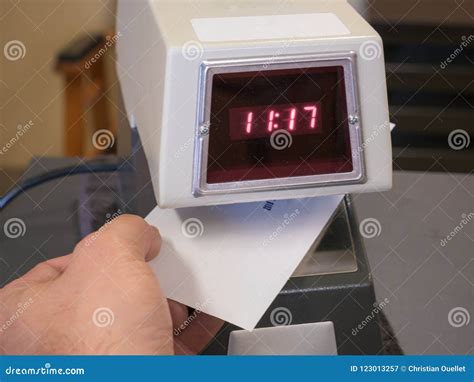 Electronic Time Recorder Machine in an Office Stock Image - Image of hand, hourly: 123013257