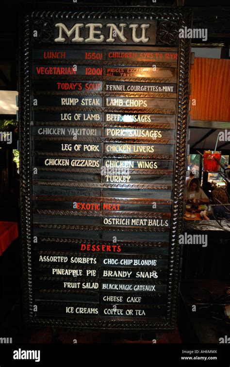 The wooden menu board at the Carnivore Restaurant Nairobi Kenya East Africa Stock Photo - Alamy