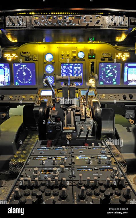 Cockpit of a Boeing 737 - 700 in a central console with hand throttles ...