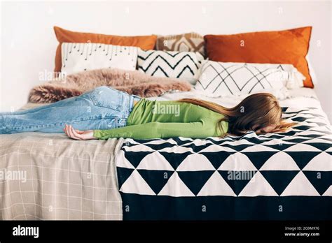 Face down on bed hi-res stock photography and images - Alamy