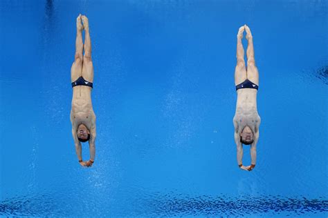 Olympic Diving Into A Pool