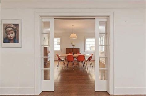 The pocket sliding French doors between the living room and the dining room are a great tou ...