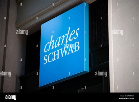 A Charles Schwab logo on a branch in Washington, D.C., as seen on August 14, 2019. (Graeme Sloan ...