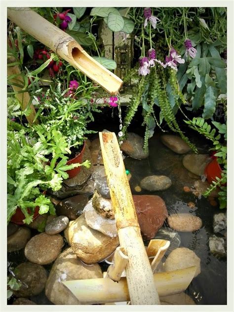 Fuente Shishi Odoshi hecha con bambú y bomba de 5w Shishi Odoshi Fountain made with bamboo and a ...