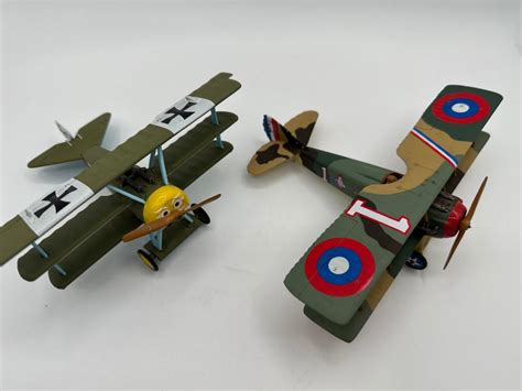 Two (2) Display Matchbox Model Planes | EstateSales.org