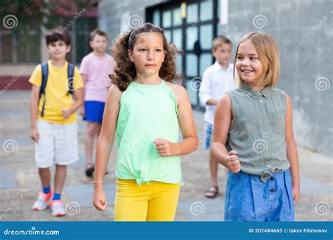 Two School Friends are Walking Along City Street Stock Image - Image of cheerful, closeup: 307484665