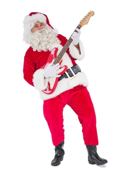 Premium Photo | Smiling santa playing electric guitar