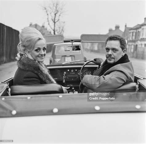 English actor Arthur White seated next to his wife Joy in the... News ...