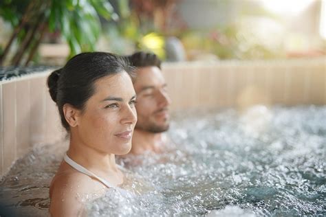 Couple relaxing in spa resort hot spa – Best cities for New Year’s Eve celebration with family ...