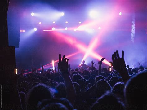 "Concert Crowd At Live Music Festival" by Stocksy Contributor "Robert Kohlhuber" - Stocksy