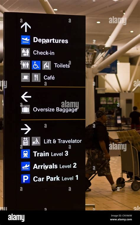 Airport Terminal Signs Stock Photo - Alamy