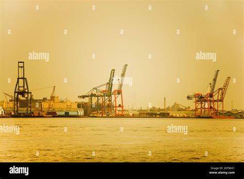 Cranes at a commercial dock Stock Photo - Alamy