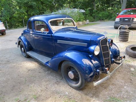 Antique 1935 PLYMOUTH PJ COUPE BLUE 2 DOOR 51k Miles Restored | EstateSales.org