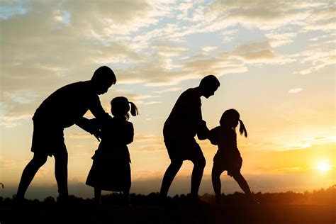 Sunset silhouette of children playing 1977750 Stock Photo at Vecteezy