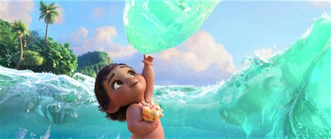 Download Baby Moana Touching Water Wallpaper | Wallpapers.com