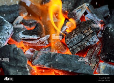 Charcoal fire wood Burning wood and coal in fireplace Stock Photo - Alamy