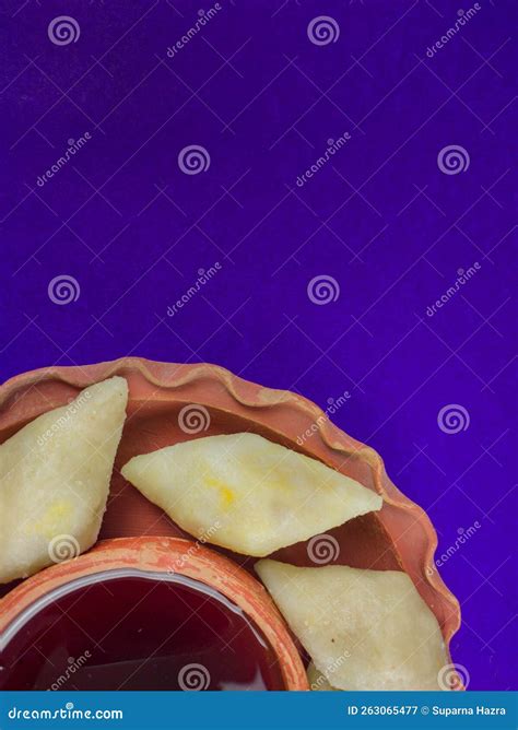 Pithe Or Rice Flour Dumplings With Coconut Fillings Being Served On A Plate With Date Palm ...