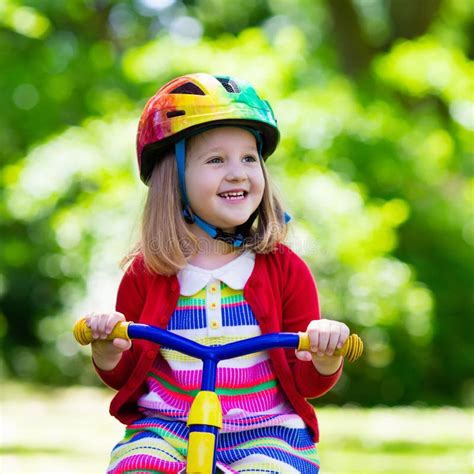 Little Girl Riding a Tricycle Stock Photo - Image of nursery ...