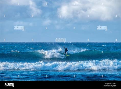 Surfing at Ho'okipa Beach Park, Maui, Hawaii, USA Stock Photo - Alamy