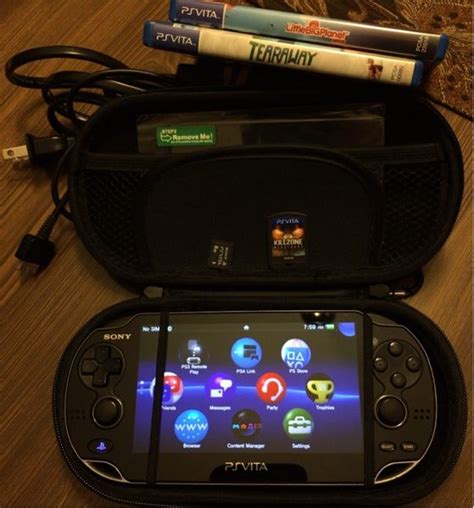 Sony playstation vita ps vita bundle with 4 games memory card 3 months ...