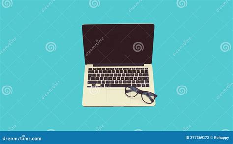 Close Up Laptop with Blank Black Screen and Eyeglasses on Blue Background Stock Photo - Image of ...
