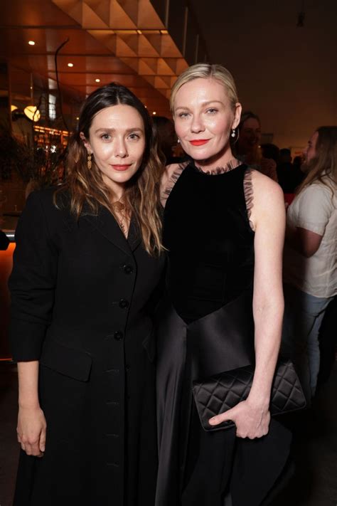 ELIZABETH OLSEN and KIRSTEN DUNST at Civil War Special Screening in Los Angeles 04/02/2024 ...