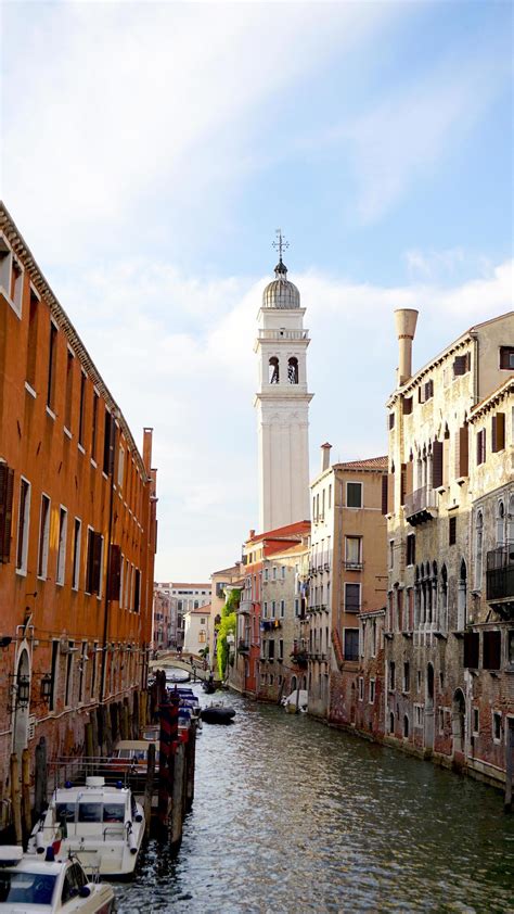 Scene of canal and boat with ancient architecture in Venice, Italy 9227361 Stock Photo at Vecteezy