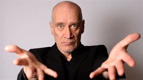 Wilko Johnson: Dr Feelgood guitarist dies, aged 75 - BBC News