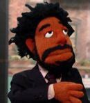 Wyatt Cenac (puppet) Voice - The Daily Show (TV Show) - Behind The ...