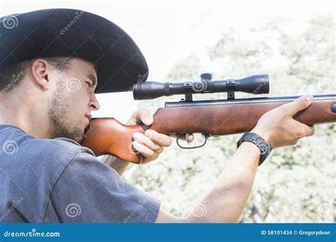 Man with Rifle stock photo. Image of aiming, hand, adult - 58101434